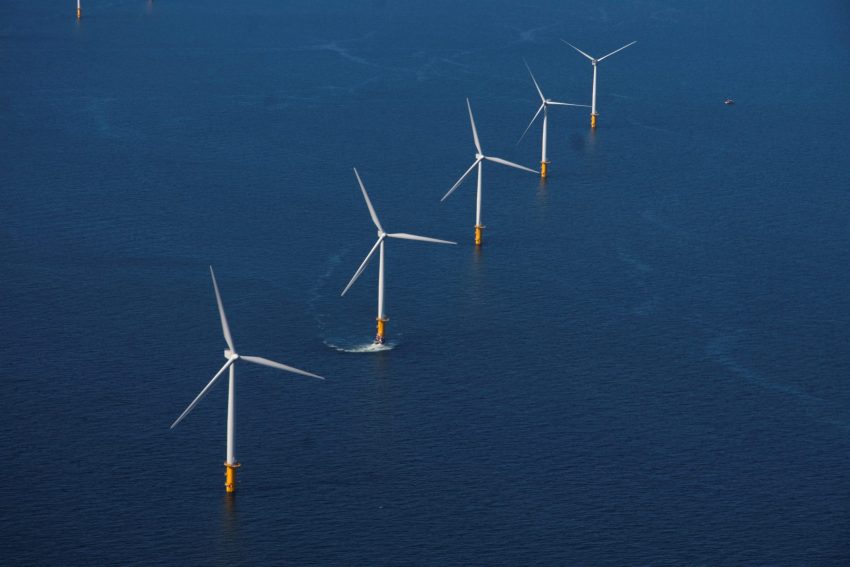 A picture of five wind turbines on an offshore wind farm